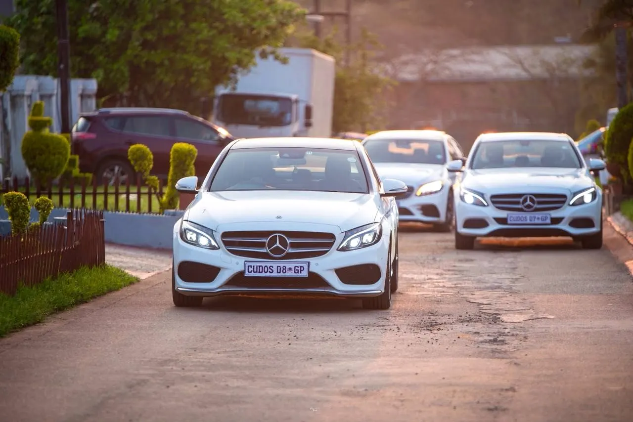 The Cudos Funerals Mercedes-Benz family cars arriving
